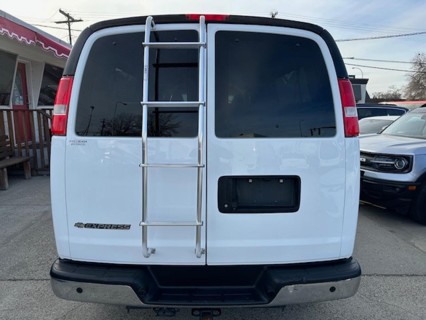 2017 White Chevrolet Express LT 3500 Extended (1GAZGPFG5H1) with an 6.0L V8 OHV 16V FFV engine, 6A transmission, located at 3200 1st Avenue North, Billings, MT, 59101, (406) 245-9055, 45.779270, -108.510742 - Off-Lease Lease Unit with Great Maintenance Records! 15 Passenger Van with LT Package, Towing, Tilt Steering, Cruise Control, Rear Air, Rear Heat, Factory Tinted Glass, Dual Power Seats and Much More! CarFax Dealer. Auto Brokers of Montana/AA&A Auto Rental/Fox Car Rental - Photo#5